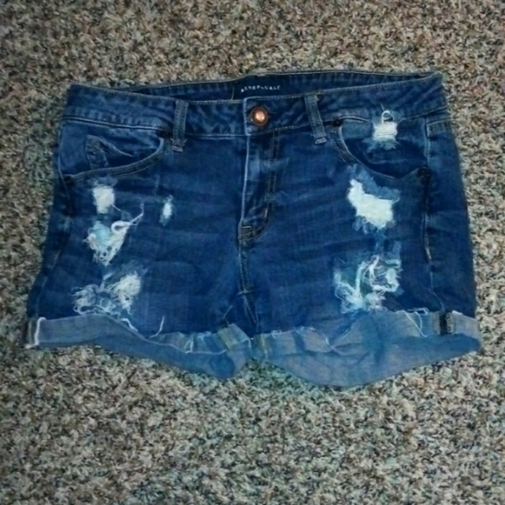 Semi ripped Blue jean shorts
